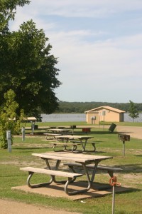 picnic tables by the lake