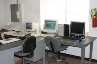 desks with computers on them at the operation center